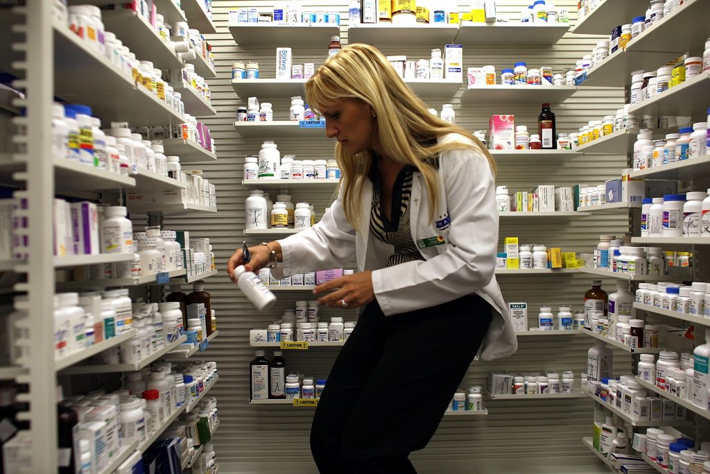 From Real-Time Glucose Tracking to Policy Wins: Diabetes News You Need Today 5 Pharmacist filling a diabetes prescription with capped insulin cost